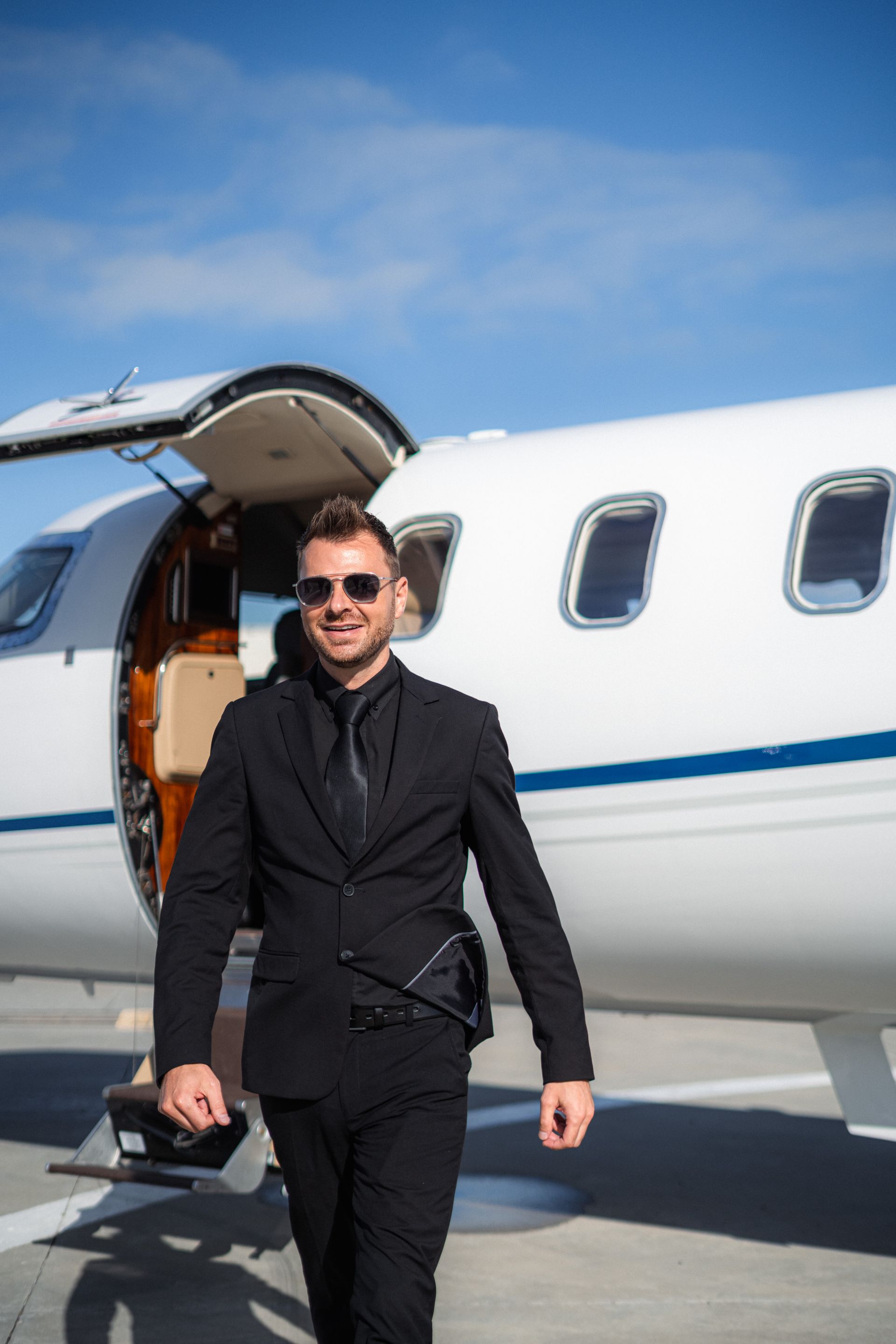 Traveler boarding a private jet